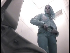 Nasty babe with stunning booty is pissing with pleasure