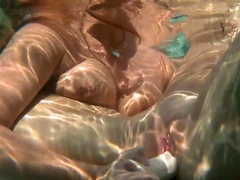 Underwater lesbian threesome with ladies in the pool