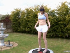 Pleasuring her pale and tender pink taco on a couch