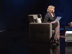 Superb looking chick is dressed in ebony tights and high stilettos as a host of the flash